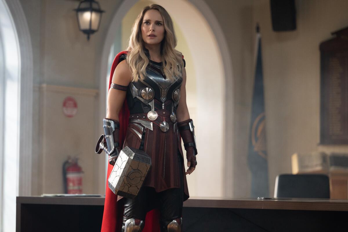 a woman in superhero armor