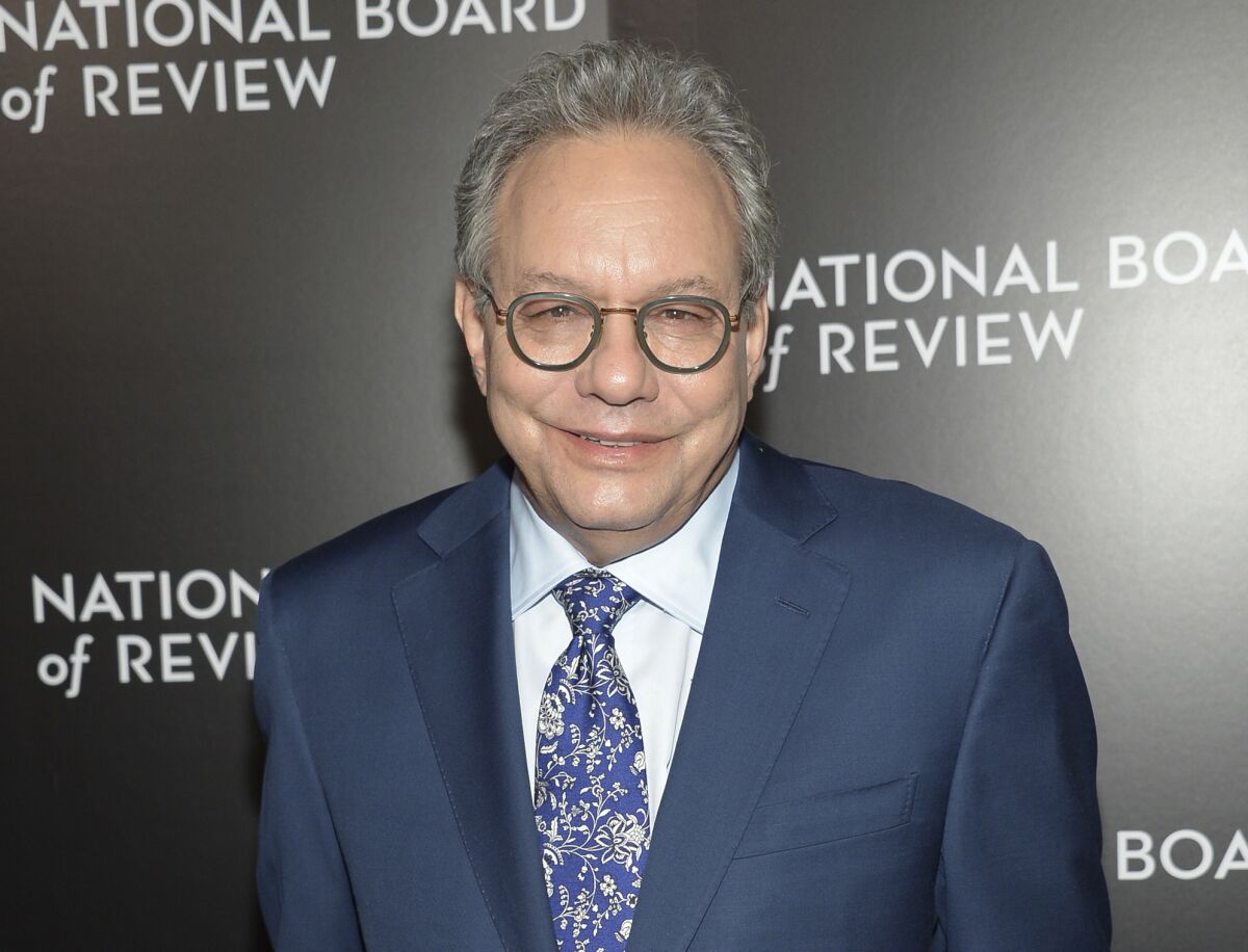 FILE - Comedian Lewis Black attends The National Board of Review Gala in New York on Jan. 5, 2016. Black is nominated for a Grammy Award for best comedy album, “Thanks for Risking Your Life,” recorded at a concert on the eve of the March 2020 COVID-19 lockdown. (Photo by Evan Agostini/Invision/AP, File)