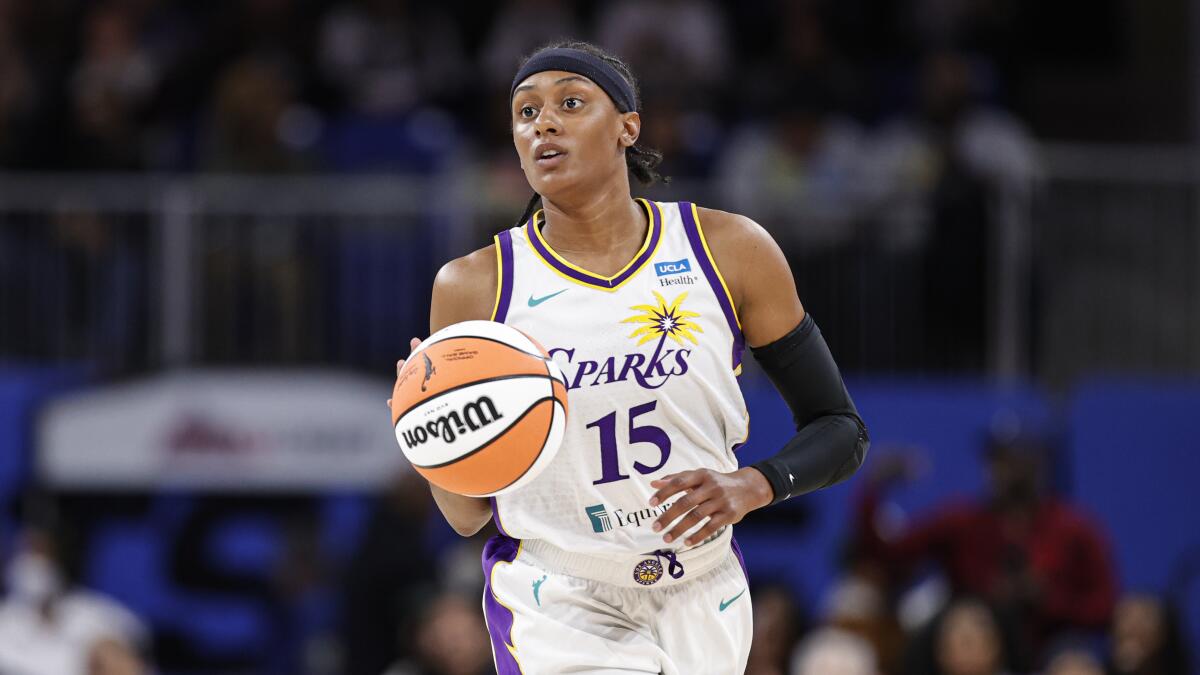 Sparks guard Brittney Sykes brings the ball up court against the Chicago Sky.