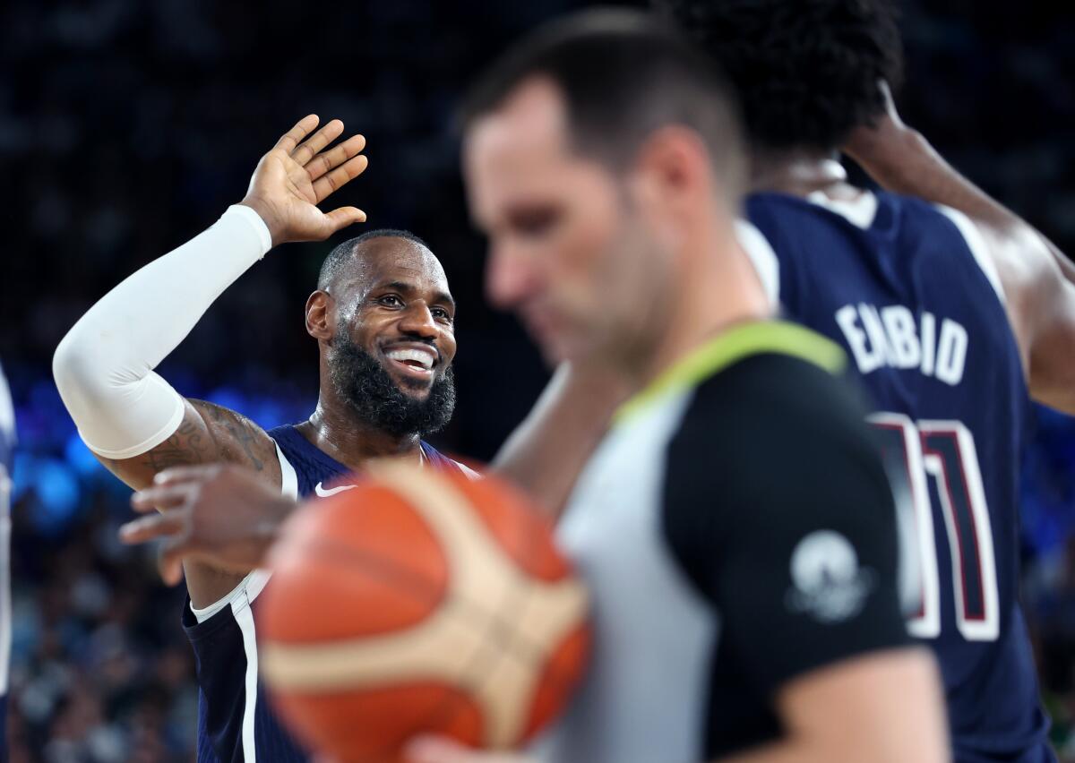 American LeBron James celebrates during the team's game against Brazil during the quarterfinals 