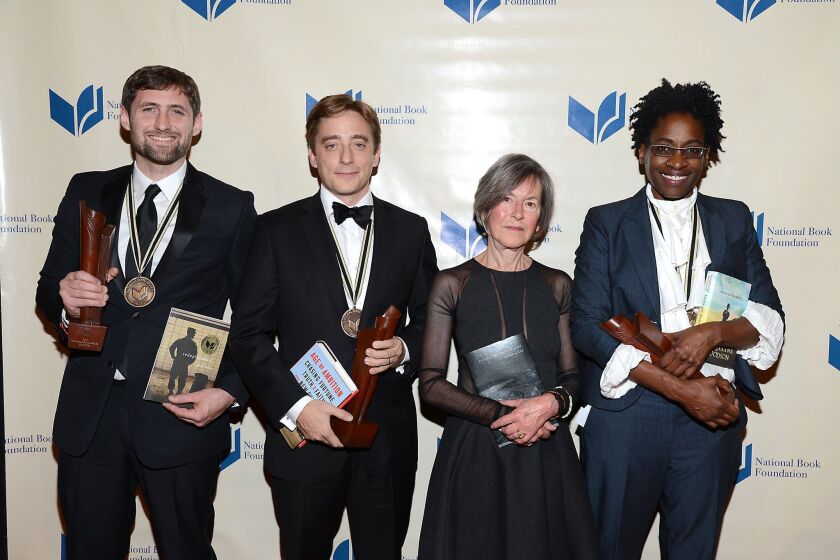 The 2014 National Book Award winners are, from left: Phil Klay for fiction; Evan Osnos for nonfiction; Louise Gluck for poetry and Jacqueline Woodson for young people's literature.