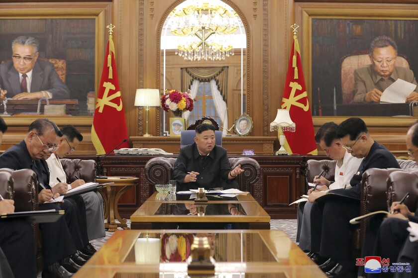 In this photo provided by the North Korean government, North Korean leader Kim Jong Un, center, attends a meeting with senior ruling party officials in Pyongyang, Monday, June 7, 2021. Independent journalists were not given access to cover the event depicted in this image distributed by the North Korean government. The content of this image is as provided and cannot be independently verified. (Korean Central News Agency/Korea News Service via AP)
