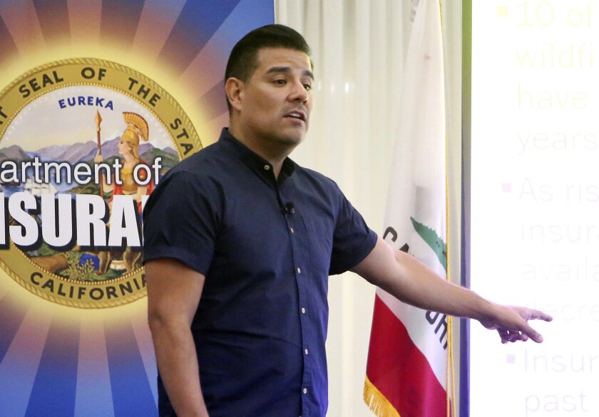 In this Aug. 22, 2019 photo, California State Insurance Commissioner Ricardo Lara discusses what his department is doing to help people in high wildfire risk areas keep insurance, in Grass Valley, Calif.