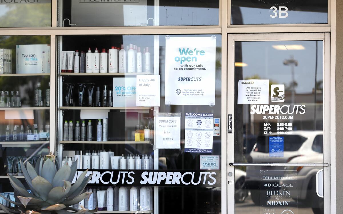 Supercuts was closed in Costa Mesa on first day of the latest shutdown.