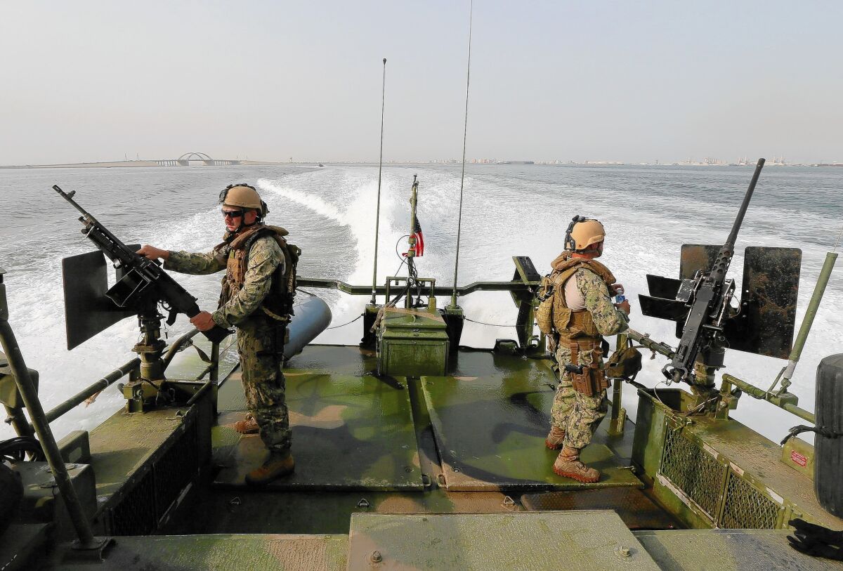 U.S. sailors patrol off Bahrain, where the Navy's 5th Fleet is based.