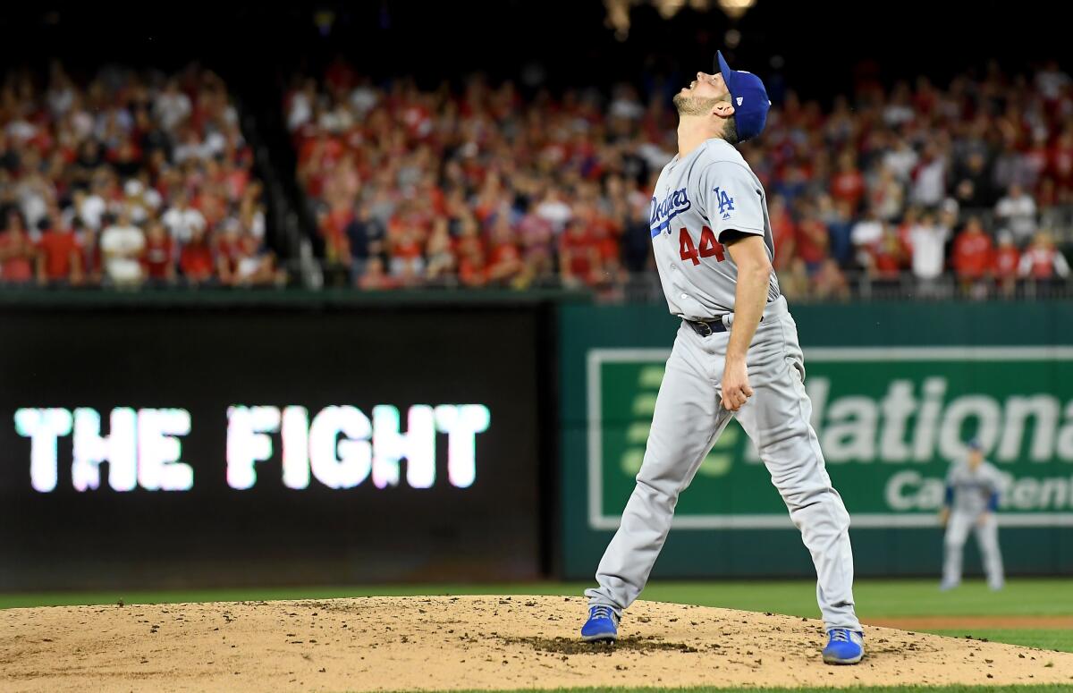 Rich Hill watches a sacrafice fly by Anthony Rendon in the third inning.