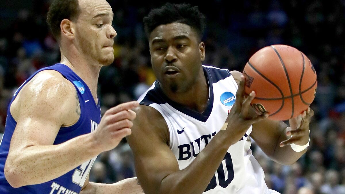 Butler forward Kelan Martin tries to power his way past Middle Tennesse forward Reggie Upshaw during the second half.