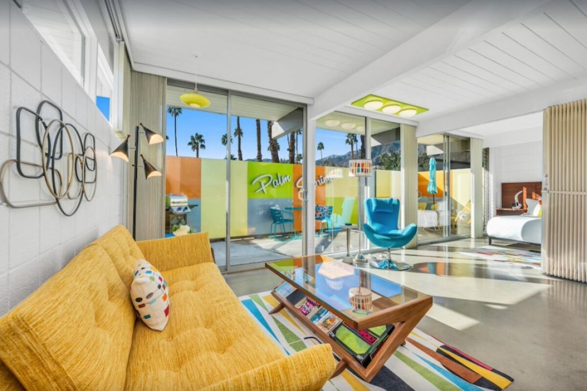 Tour Elvis' house and more at Modernism Week in Palm Springs Interior of a brightly colored hotel room.