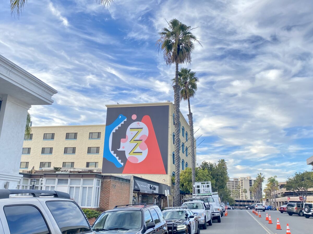 Murals of La Jolla plans to resume its walking tours on Wednesday, April 28. Math Bass' "Newz!" will be included in the tour.
