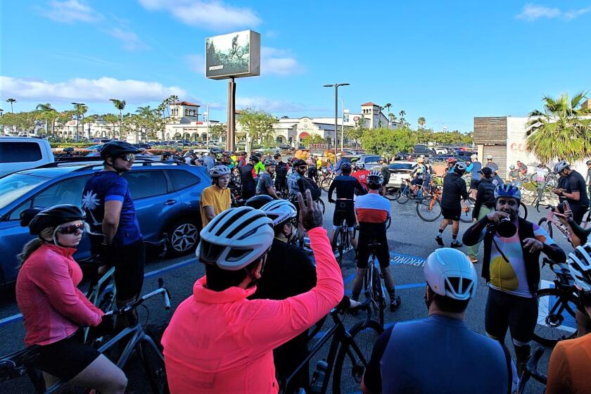 Cyclists convene outside Specialized Costa Mesa on Harbor Boulevard in May for a monthly "Donut Ride."