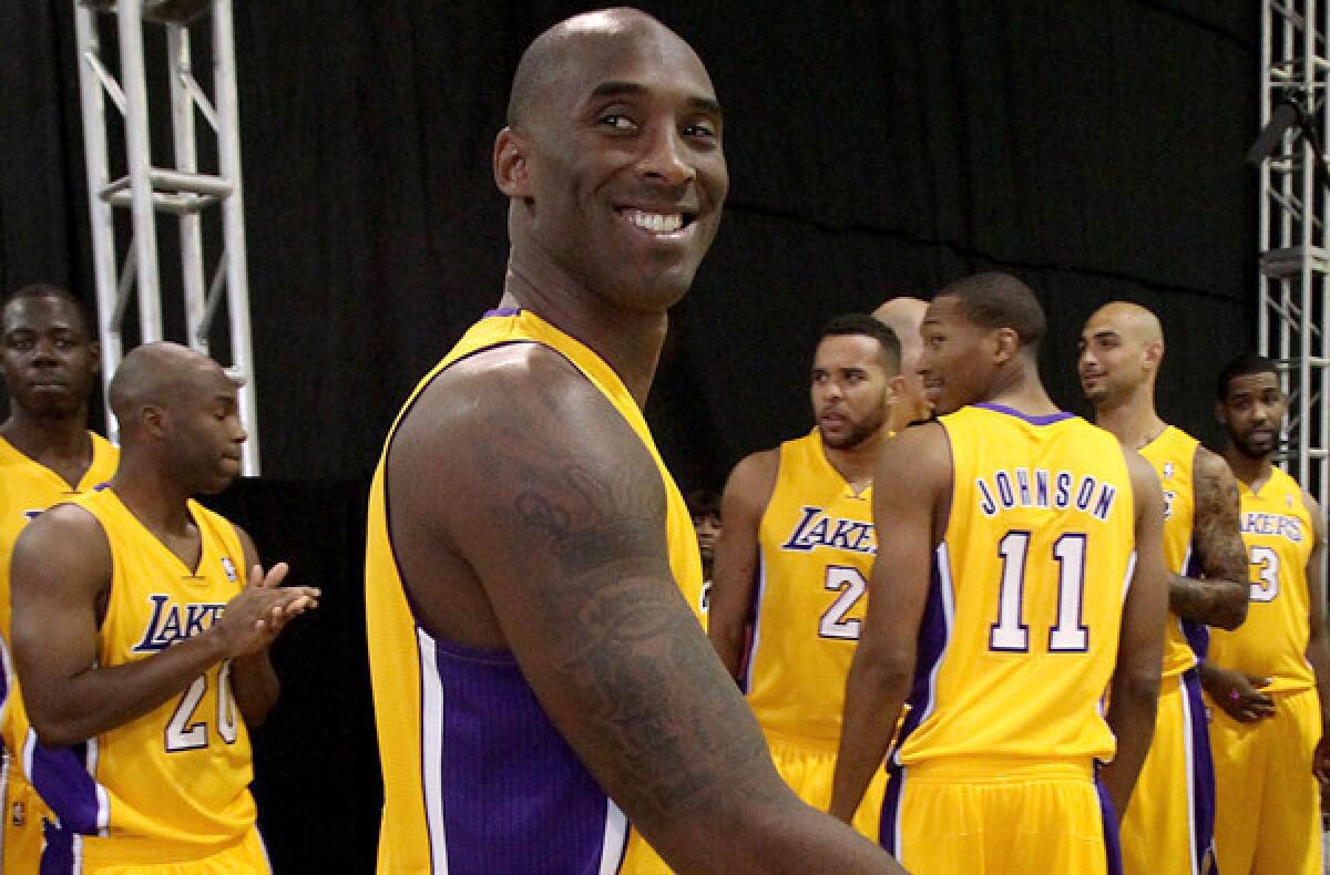 Kobe Bryant was all smiles at the Lakers' media day this fall. On Sunday, expect more of a scowl as he returns to the court for his season debut.