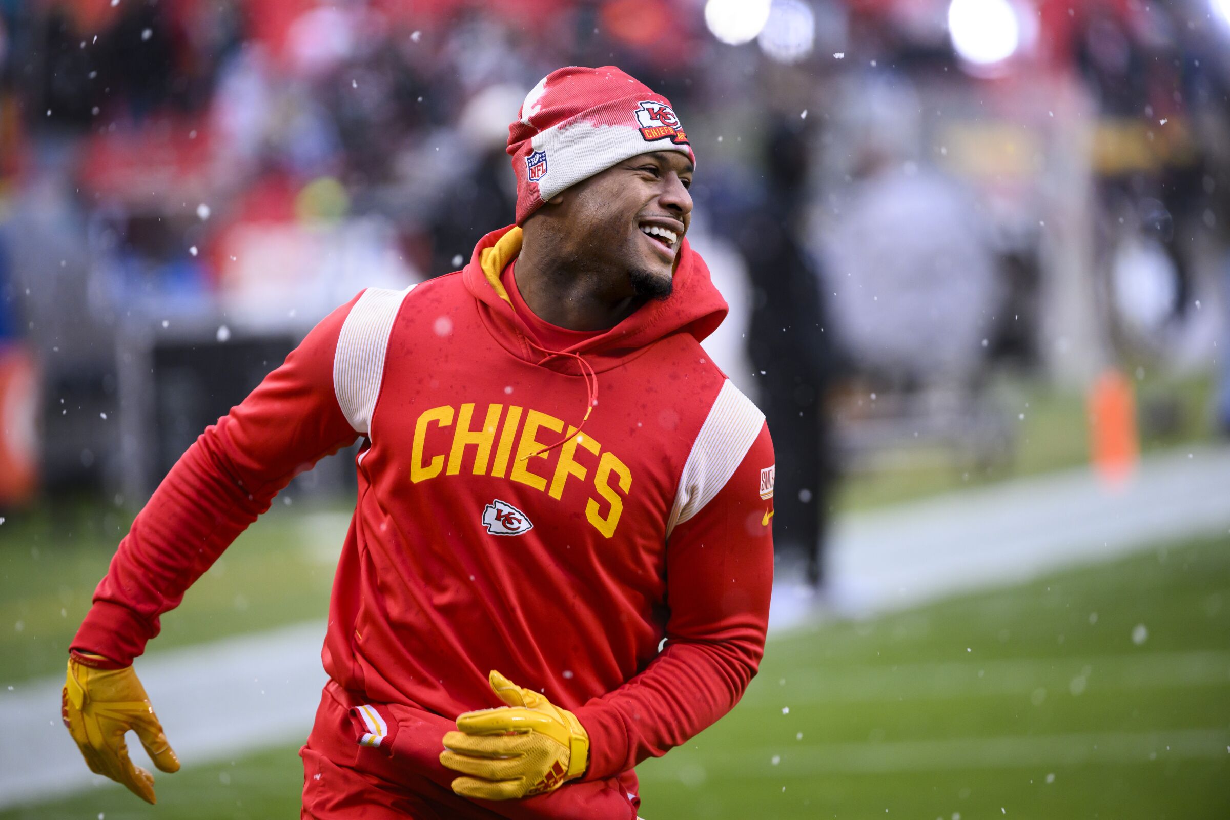 Kansas City Chiefs wide receiver JuJu Smith-Schuster laughs during warmups before a game.