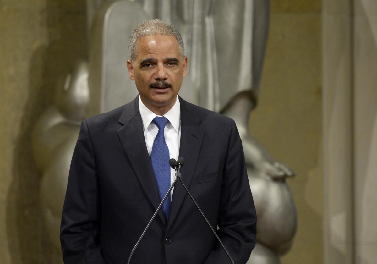 Atty. Gen. Eric Holder speaks at the Justice Department's Diversity and Inclusion Speaker Series on Wednesday at the Justice Department in Washington.