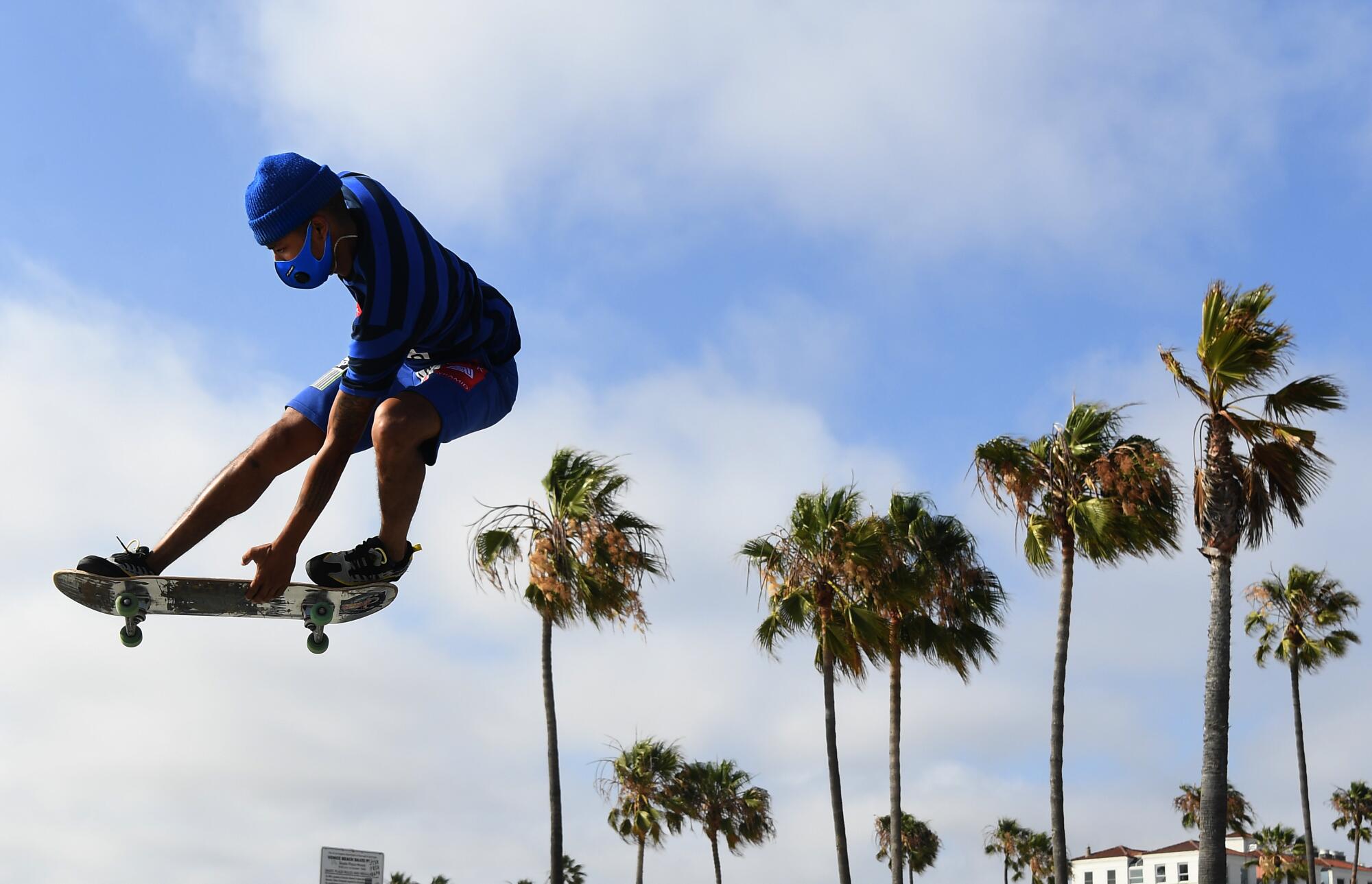 Isiah Hilt gets air while doing tricks in Venice Beach on Tuesday.