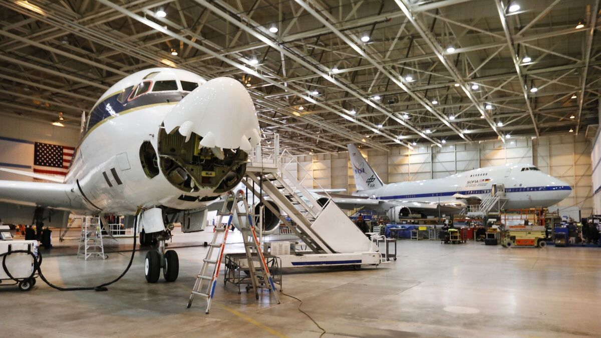 The NASA-operated DC-8 in its Palmdale hangar between missions.