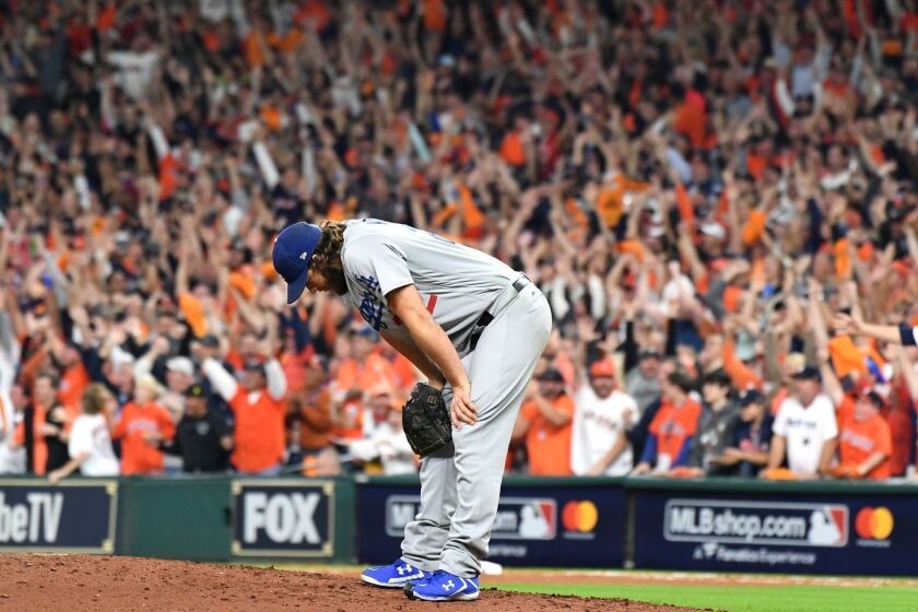 HOUSTON, TEXAS OCTOBER 29, 2017-Dodgers pitcher Clayton Kershaw gives up a three-run home run to Astros Yuli Gurriel in the 4th inning in Game 5 of the World Series at Minute Maid Park in Houston Sunday. (Wally Skalij/Los Angeles Times)
