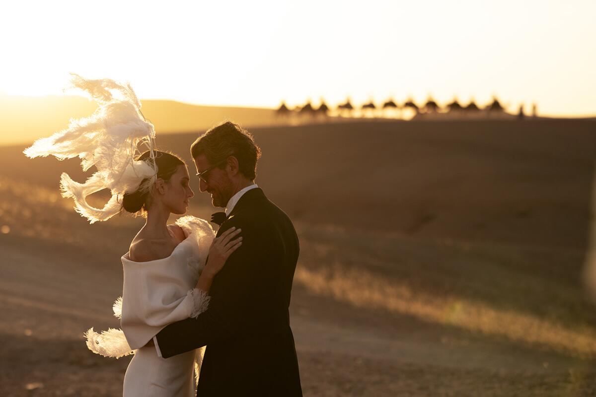 A bride and groom in the desert outside of Marrakech.