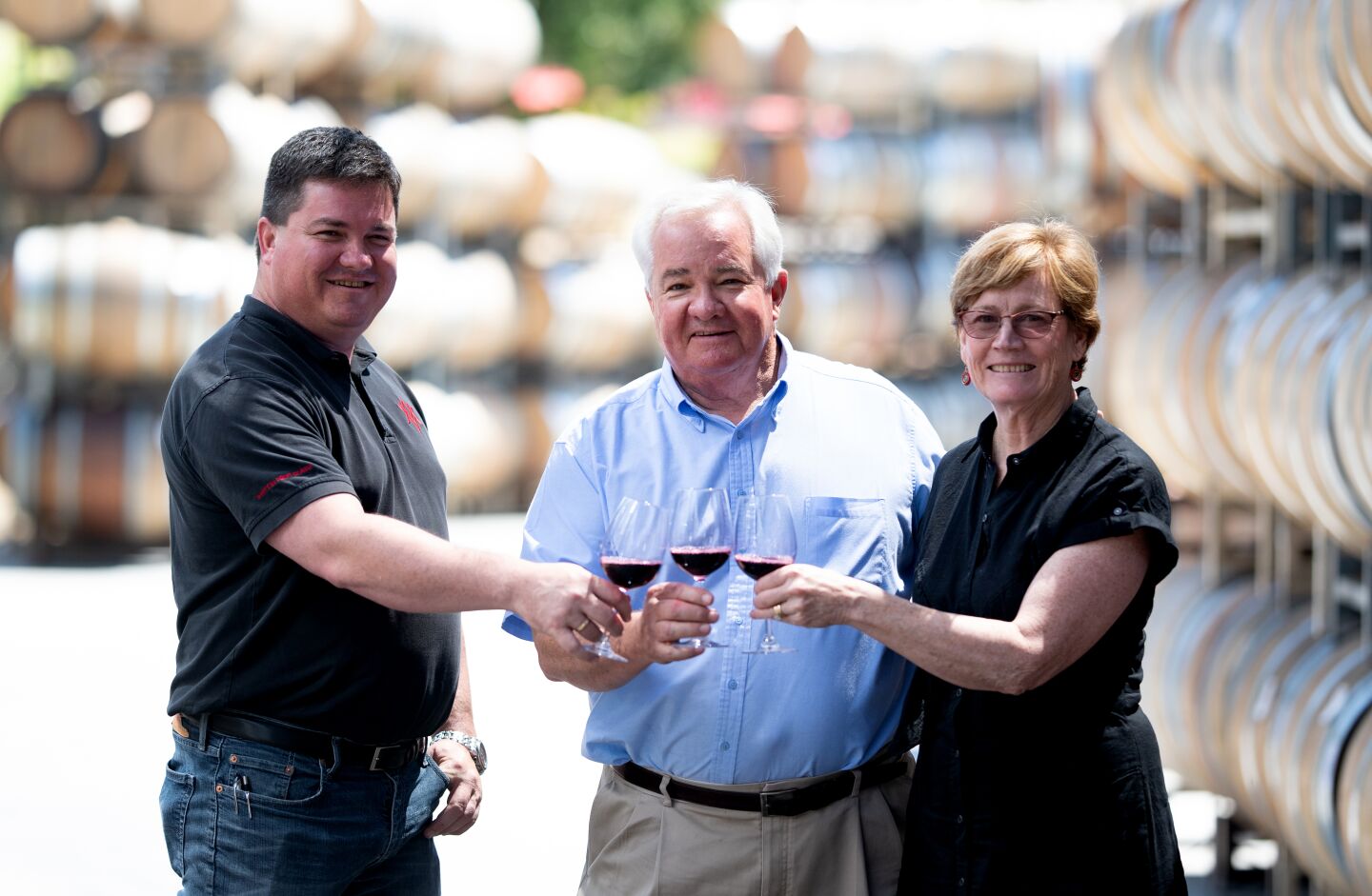Hank Wetzel is flanked by son Harry, left, and his wife, Linda, at their family-owned winery, Alexander Valley Vineyards.