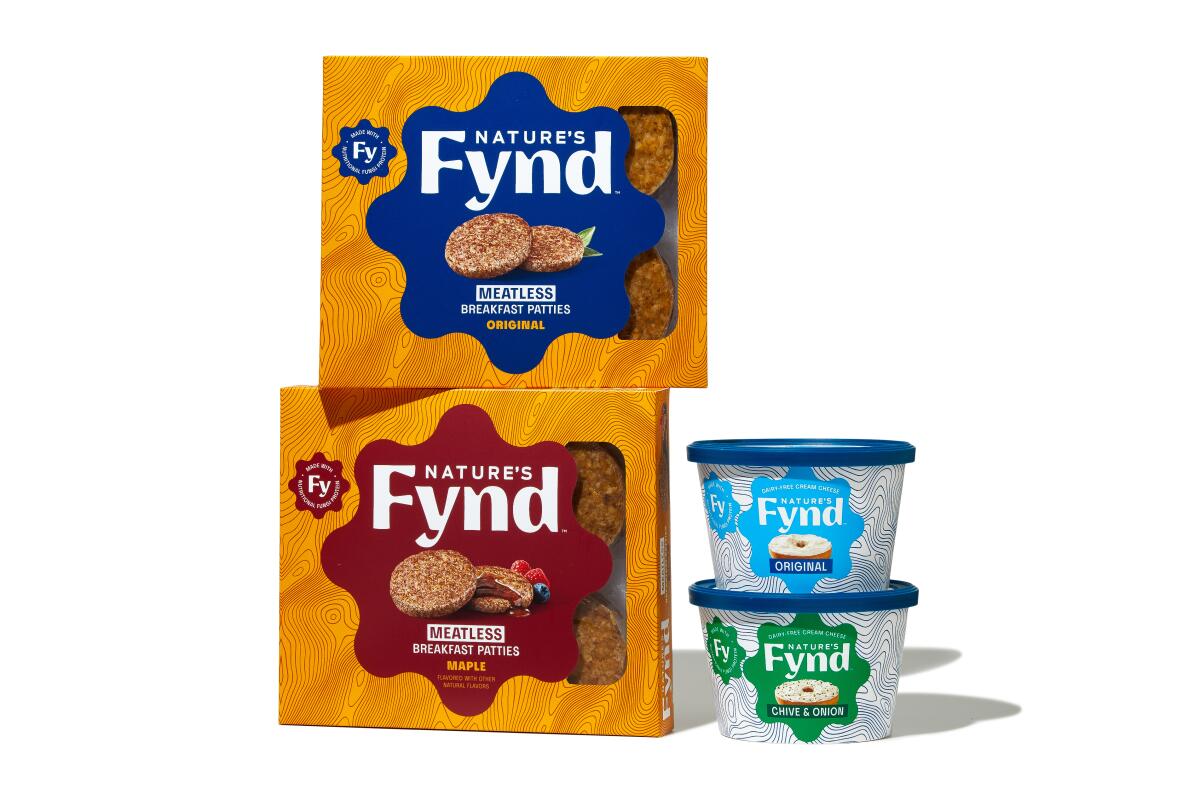 Two packages and two tubs with Nature's Fynd labels