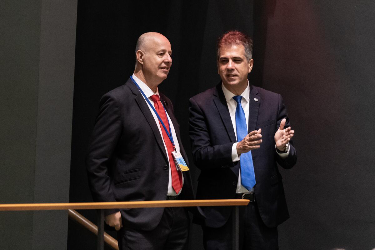 Israel National Security Advisor Tzachi Hanegbi speaks with Israel Foreign Minister Eli Cohen.