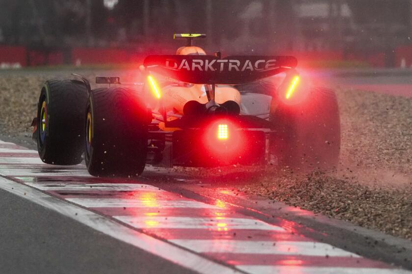 McLaren driver Lando Norris of Britain steers his car during the sprint qualifying session for the Chinese Formula One Grand Prix at the Shanghai International Circuit, Shanghai, China, Friday, April 19, 2024. (AP Photo/Andy Wong)