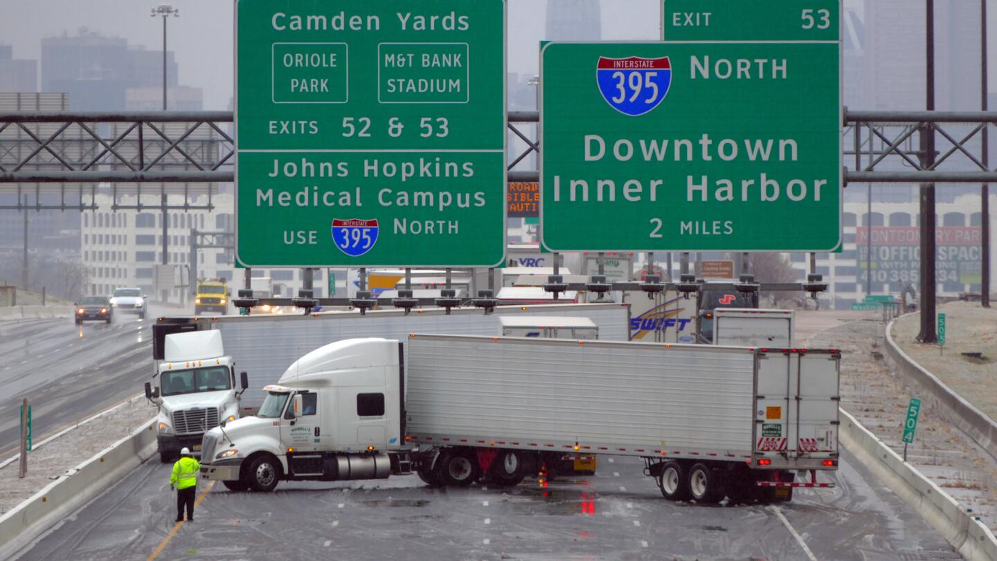 In a view looking north from the Caton Avenue overpass, vehicles return south in single file during the scene of a crash that shut down I-95.