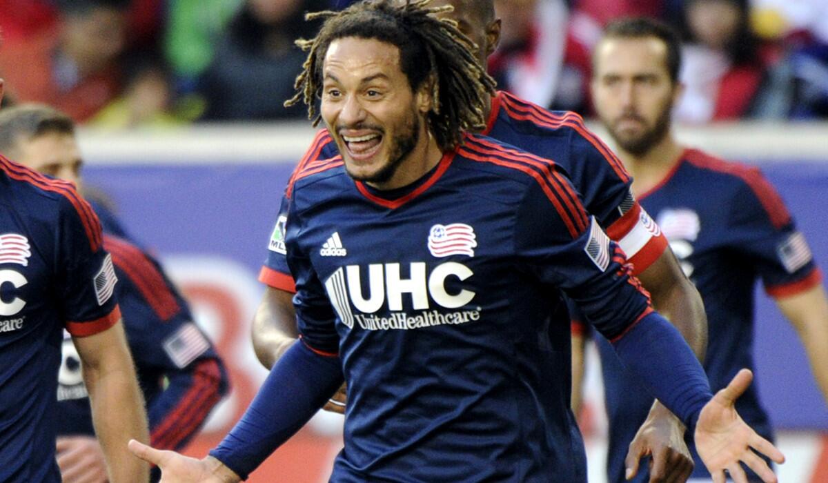 Revolution midfielder Jermaine Jones celebrates his goal against the Red Bulls in the second half of an MLS Eastern Conference playoff game Sunday.