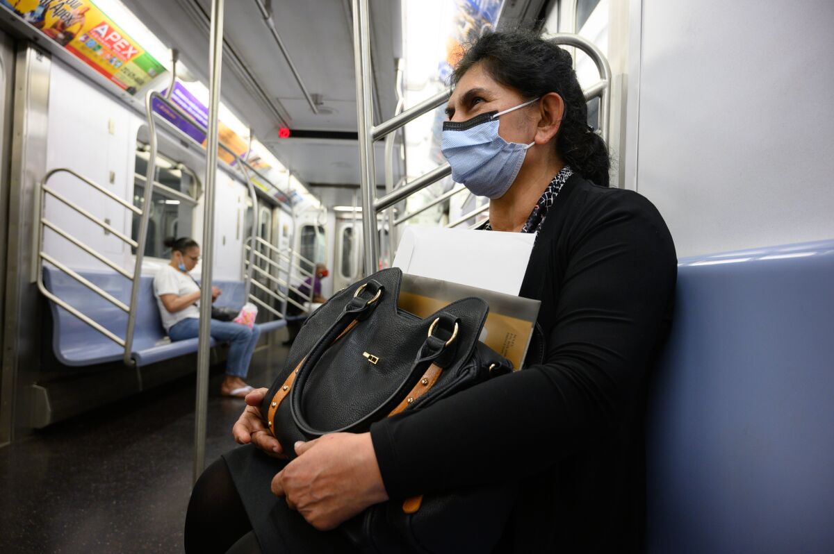 Azra Nazir rides the subway home after receiving her U.S. citizenship in New York. 