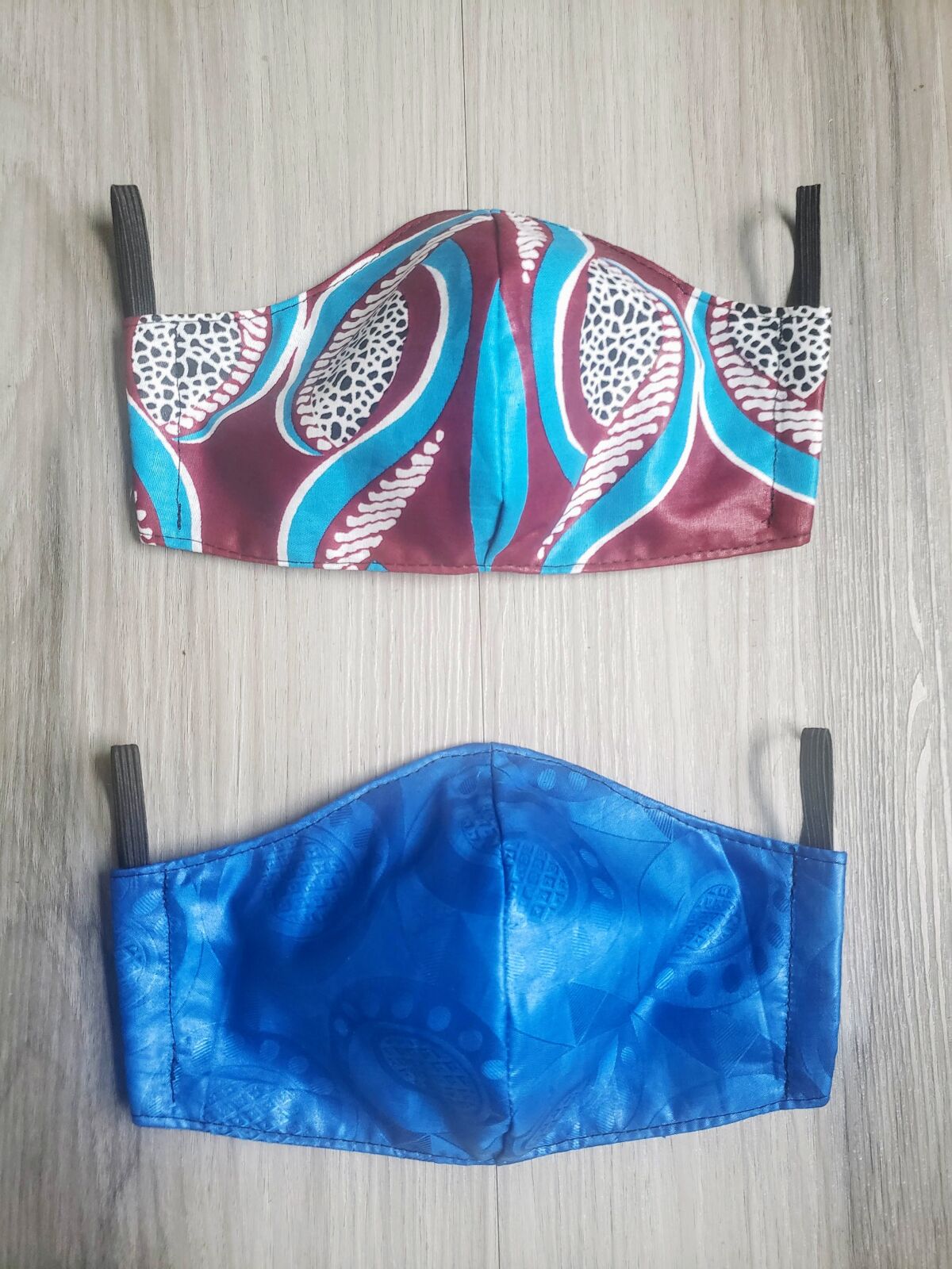 TEGAA's face masks in Maroon Swirl (above) and Royal Blue (below).