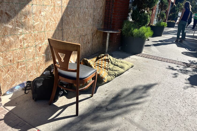 A homeless person's sleeping bag lays on Girard Avenue in La Jolla. 