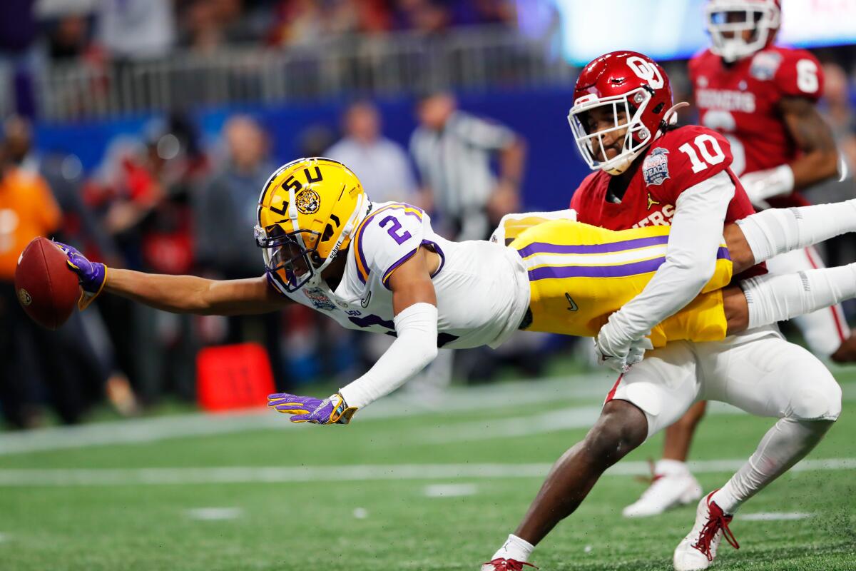LSU wide receiver Justin Jefferson scores a touchdown against the Oklahoma Sooners in the Peach Bowl on Dec. 28.