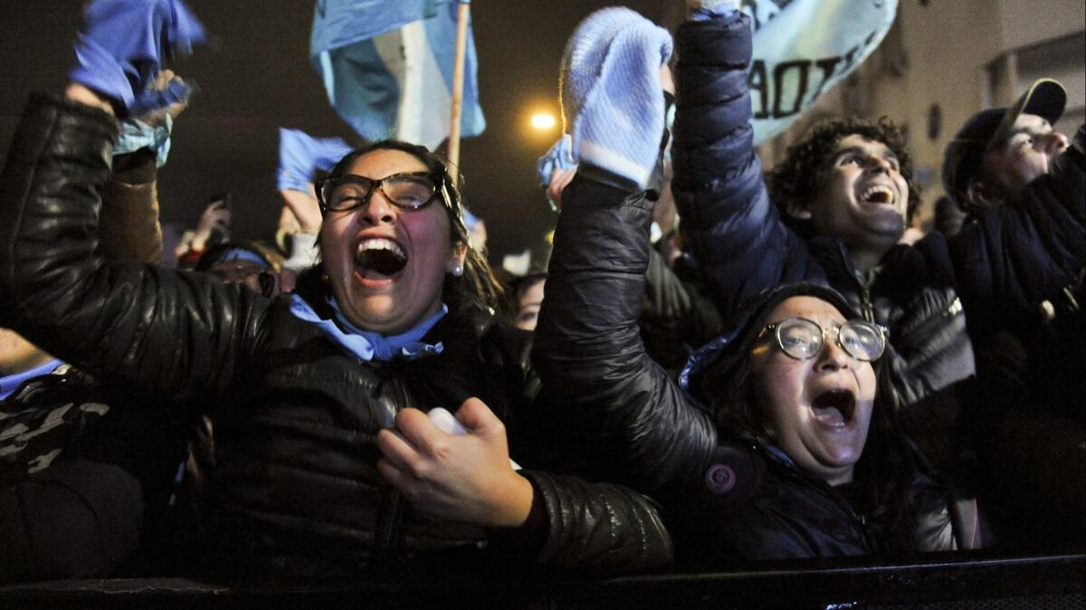 Demonstrators against decriminalizing abortion celebrate outside Congress in Buenos Aires.
