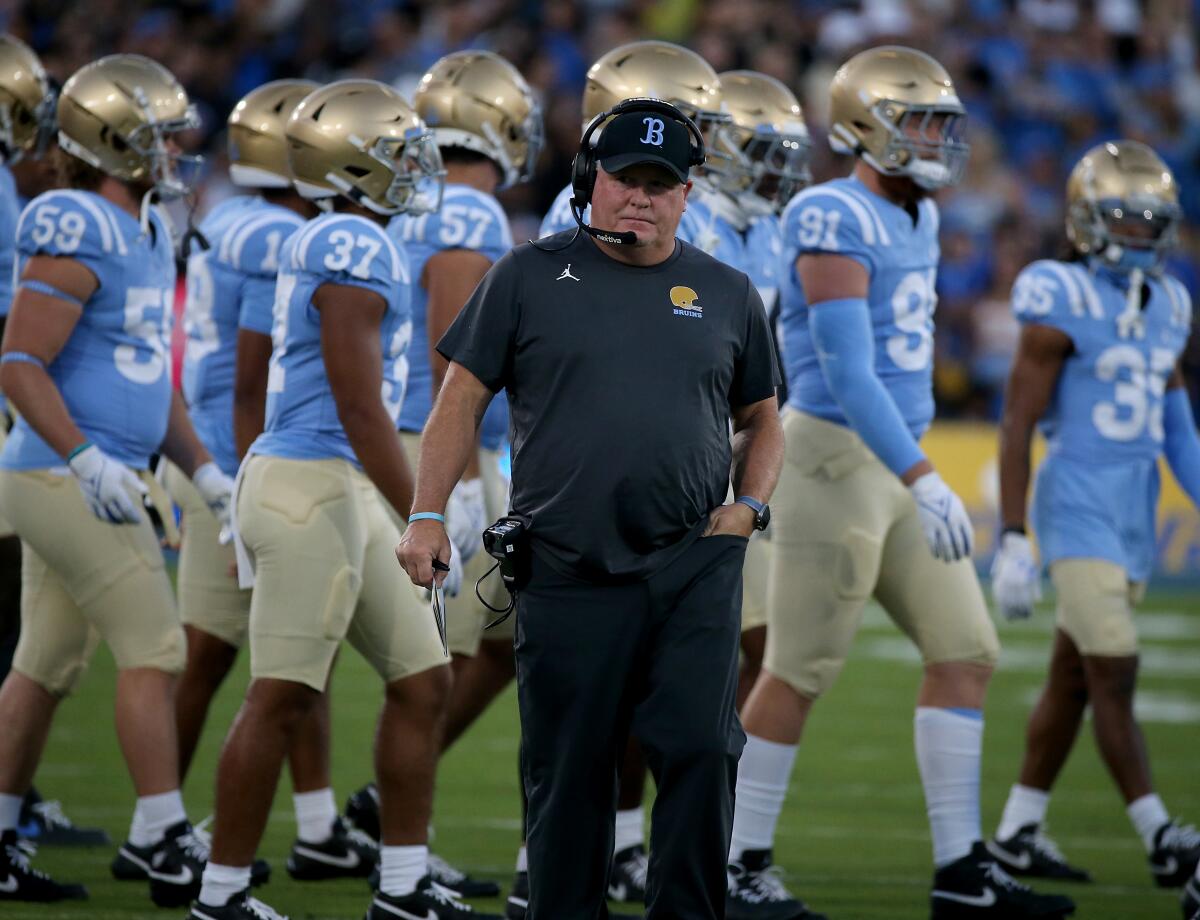 UCLA coach Chip Kelly walks on the field during a win over Colorado on Oct. 28 at the Rose Bowl.