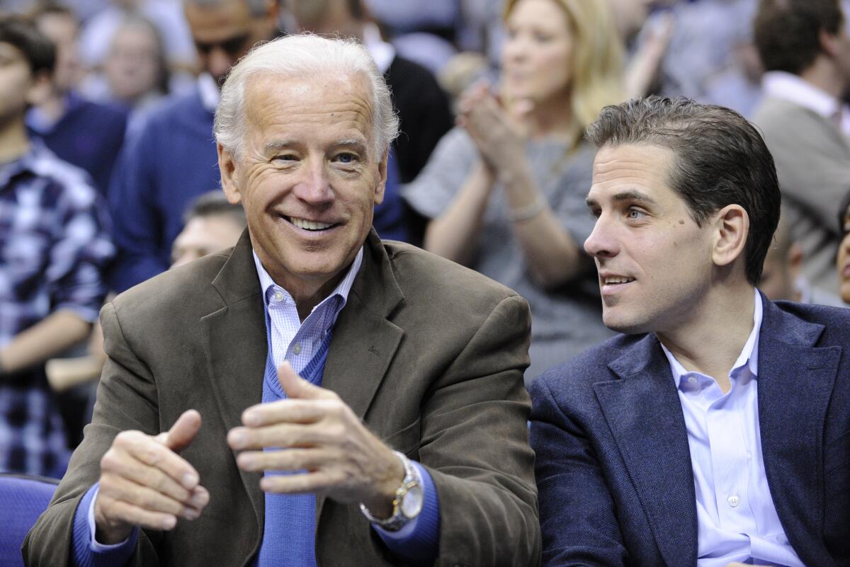 Then-Vice President Joe Biden, left, with his son Hunter in 2010