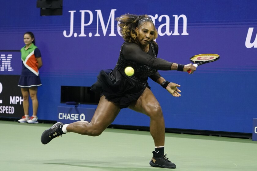 Serena Williams chases down a return against Danka Kovinic at the U.S. Open on Monday.
