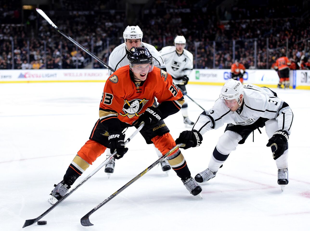 Ducks right wing Jakob Silfverberg controls the puck against Kings defenseman Brayden McNabb during the third period.