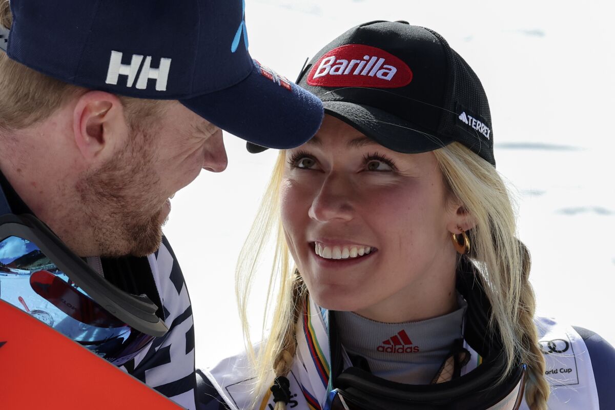 United States' Mikaela Shiffrin, right, and boyfriend Norway's Aleksander Aamodt Kilde look at each other on the last day of the alpine ski, World Cup season, in Soldeu, Andorra, Sunday, March 19, 2023. (AP Photo/Alessandro Trovati)