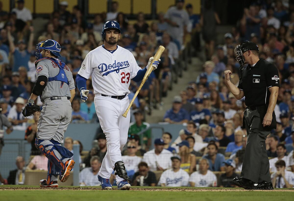 Dodgers first baseman Adrian Gonzalez reacts after striking out against Mets pitcher Noah Syndergaard during Game 2 of the NLDS.