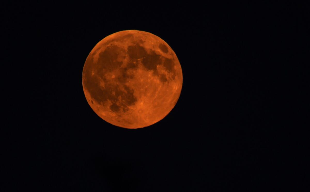 A view of a supermoon on Aug. 29 that was seen over Skopje, the capital of the Republic of Macedonia. The next supermoon, which coincides with a lunar eclipse, will happen Sunday evening.