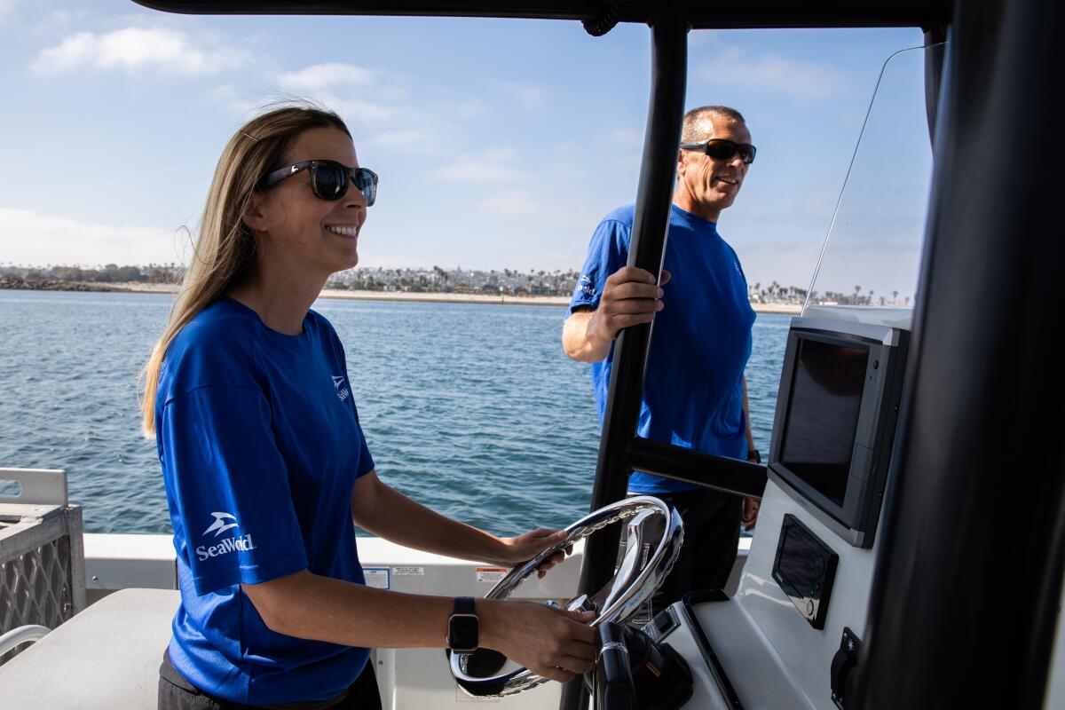 Jeni Smith and Eric Otjen, rescuers at SeaWorld San Diego