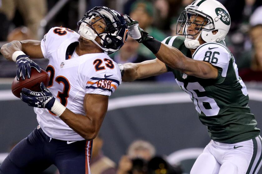 Chicago Bears cornerback Kyle Fuller (23) intercepts a pass in the end zone intended for New York Jets wide receiver David Nelson (86) in the third quarter Monday night.
