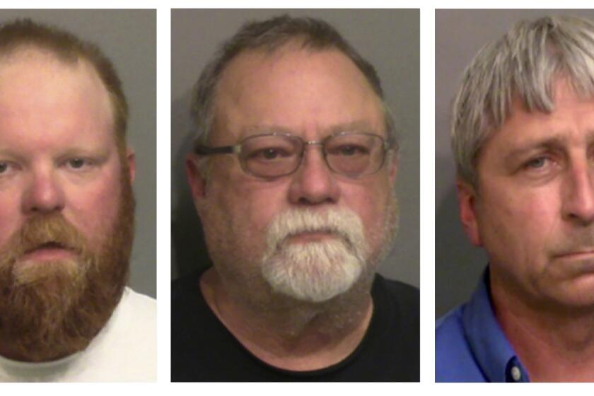 FILE - This combo of booking photos provided by the Glynn County, Ga., Detention Center, shows from left, Travis McMichael, his father Gregory McMichael, and William "Roddie" Bryan Jr. Legal experts say federal hate crimes charges in the 2020 chase and killing of Ahmaud Arbery could prove more difficult to prosecute than the fall murder trial that ended in convictions of three white men. Jury selection is scheduled to begin Monday, Feb. 7, 2022 in U.S. District Court in Brunswick, Georgia.(Glynn County Detention Center via AP, File)