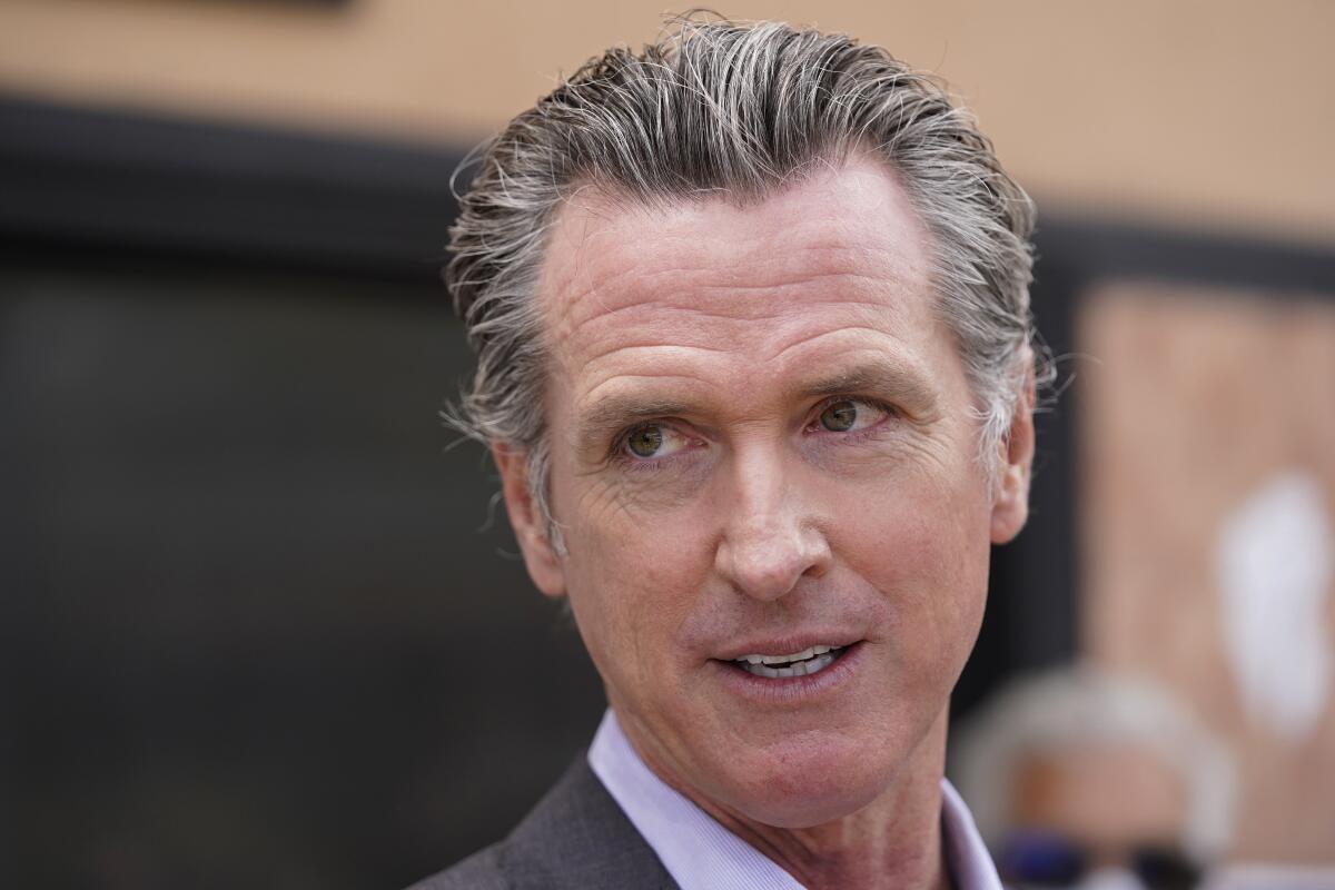 California Gov. Gavin Newsom listens to questions during a news conference in San Francisco, on June 3, 2021. It will cost California counties an estimated $215 million to stage an expected recall election this year that could oust Newsom from office. (AP Photo/Eric Risberg)