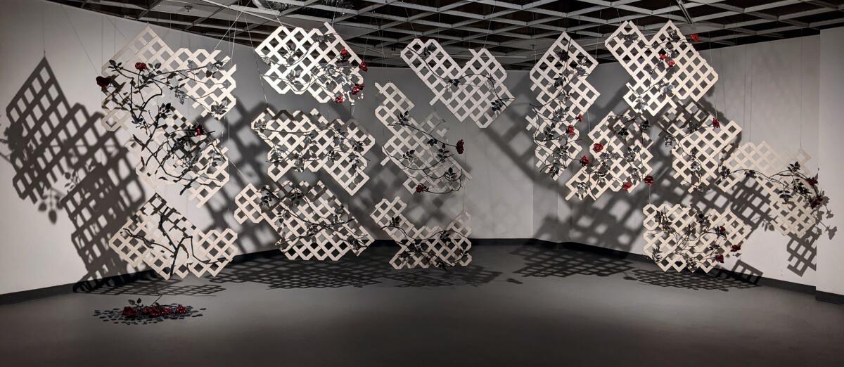 A fragmented rose trellis made of steel