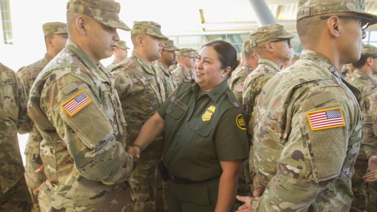 Gloria Chavez, the Border Patrol chief in the El Centro sector, welcomes California National Guard members on Monday. They will bolster border security and other duties but will not be asked to arrest immigrants crossing the border illegally.