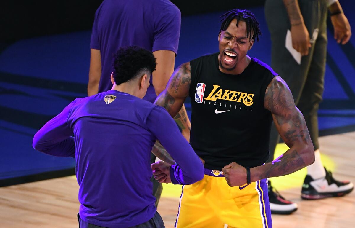 Lakers center Dwight Howard and guard Danny Green get pumped up before an NBA Finals game.