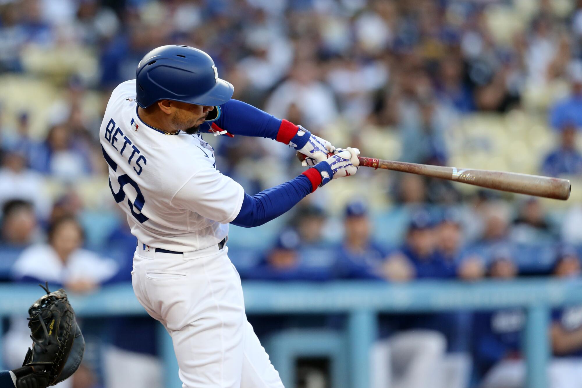 Dodgers right fielder Mookie Betts hits a solo home run against the Yankees at Dodger Stadium.