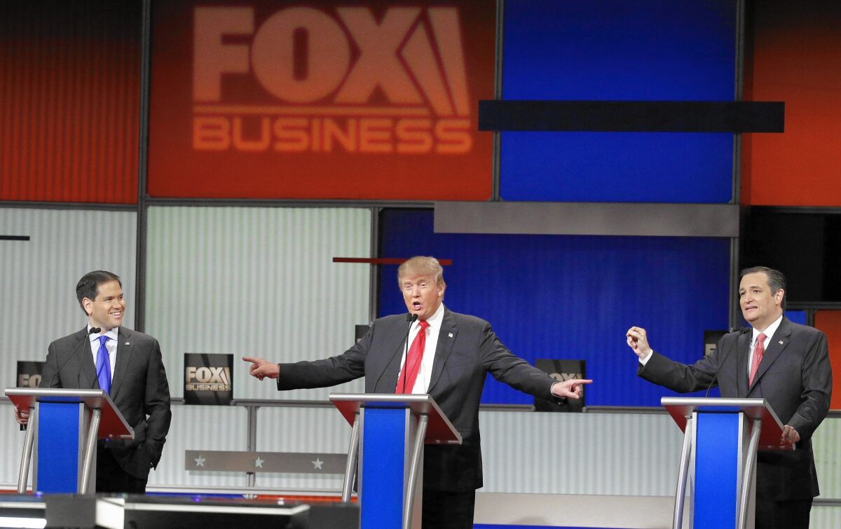 Republican presidential candidates Sen. Marco Rubio, left, Donald Trump and Sen. Ted Cruz debate in January.