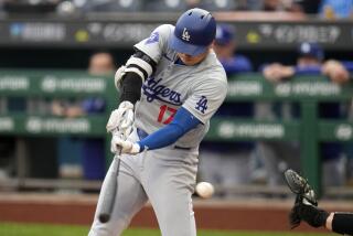 Los Angeles Dodgers' Shohei Ohtani strikes out against Pittsburgh Pirates starting pitcher Paul Skenes during the first inning of a baseball game in Pittsburgh, Wednesday, June 5, 2024. (AP Photo/Gene J. Puskar)