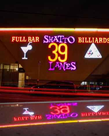 Shatto 39 Lanes features colorful indoor lighting.